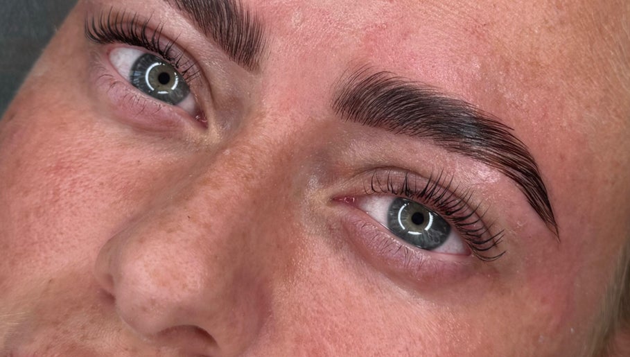 Close-up of perfectly shaped brows at By Ellie, Hemsworth, England, GB. Highlighting precision beauty care.
