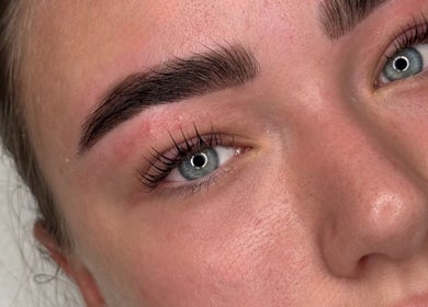 Close-up of expertly shaped eyebrows at By Ellie, Hemsworth, England, GB, showcasing natural beauty enhancement.