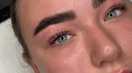 Close-up of expertly shaped eyebrows at By Ellie, Hemsworth, England, GB, showcasing natural beauty enhancement.