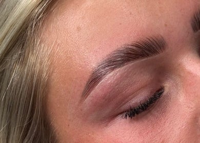 Close-up of expertly styled eyebrows at By Ellie, Hemsworth, England, GB, showcasing detailed beauty craftsmanship.