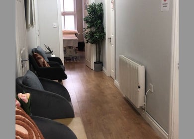 Cozy hallway at Velora Medical Aesthetics, Dublin, County Dublin, IE, with elegant seating and decor.