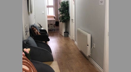 Cozy hallway at Velora Medical Aesthetics, Dublin, County Dublin, IE, with elegant seating and decor.