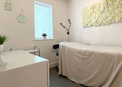 Lianne Adora Skin & Brows treatment room in Holmfirth, England, GB, featuring a relaxing bed and elegant decor.