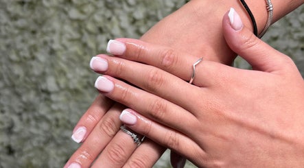 Manicured hands with elegant French tips at Siennarubybeauty, Westerham, England, GB.