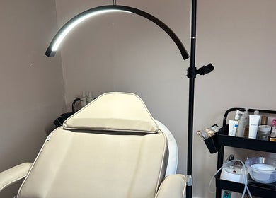 Treatment chair and tools at Glow Beauty by Sian, Solihull, England, GB, showcasing a serene setup.