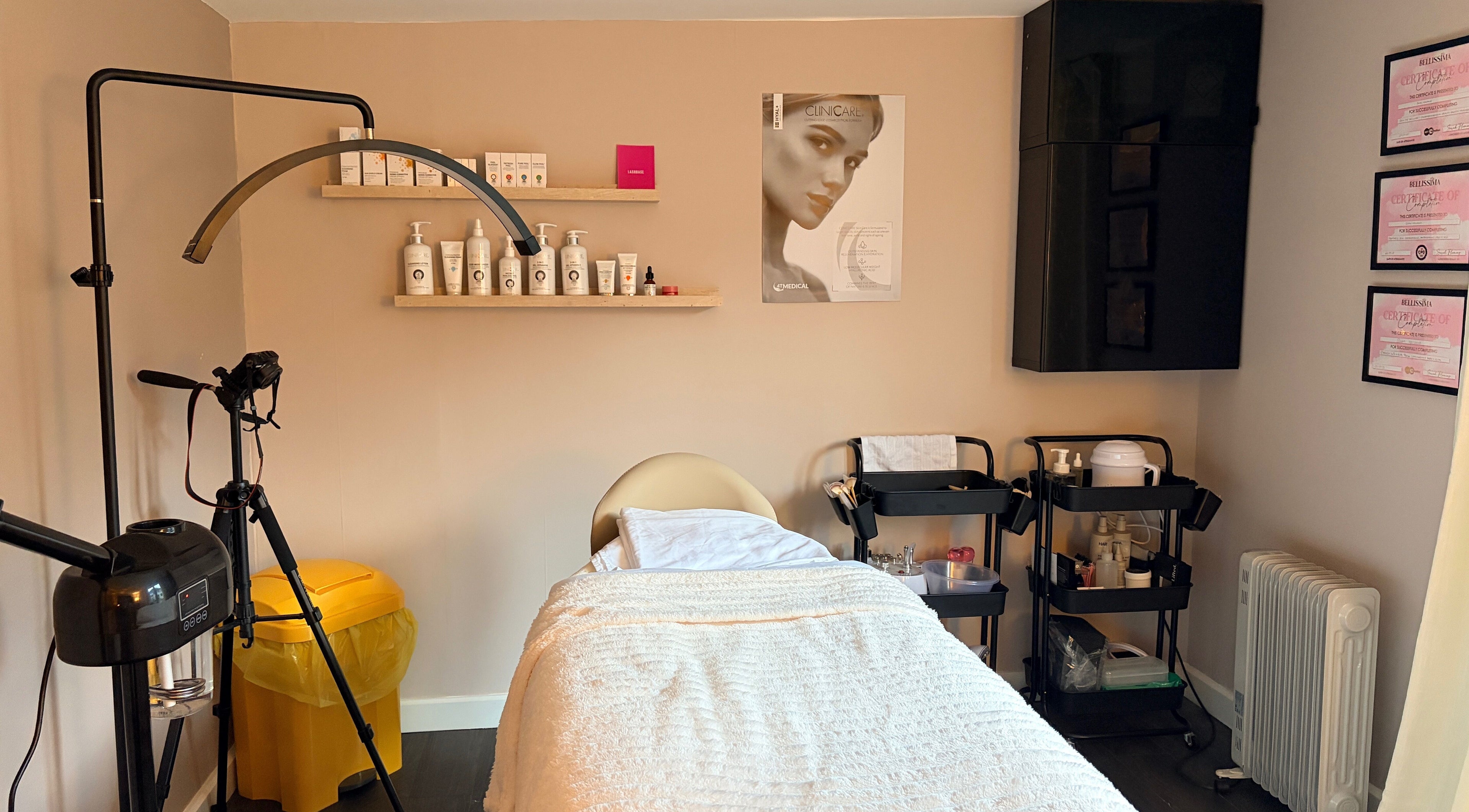 Calm treatment room at Glow Beauty by Sian, featuring soft lighting and professional skincare products in Solihull, England, GB.