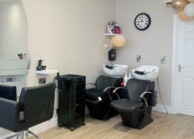 Dream Hair salon chairs and styling area in Huntingdon, England, GB.