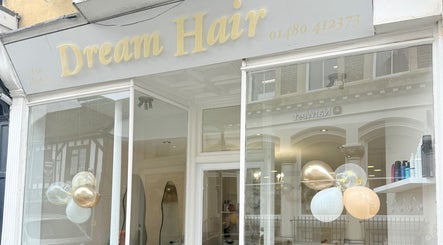 Exterior of Dream Hair salon in Huntingdon, England, showcasing modern design and stylish decor.