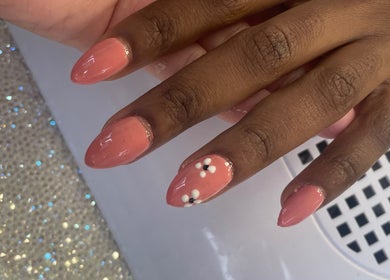Elegant floral nail art at Beauty From The Art By Leigh Hannah, Stoke-on-Trent, England, GB.