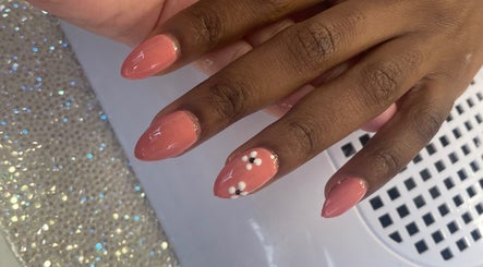 Elegant floral nail art at Beauty From The Art By Leigh Hannah, Stoke-on-Trent, England, GB.