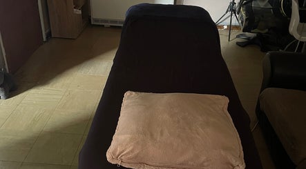 Massage table at Beauty From The Art By Leigh Hannah in Stoke-on-Trent, England, GB, offering a serene ambiance.