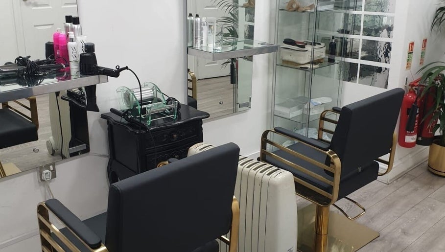 Modern salon chairs and hair products at Ray's House of Beauty Kingston, Kingston Upon Thames, England, GB.