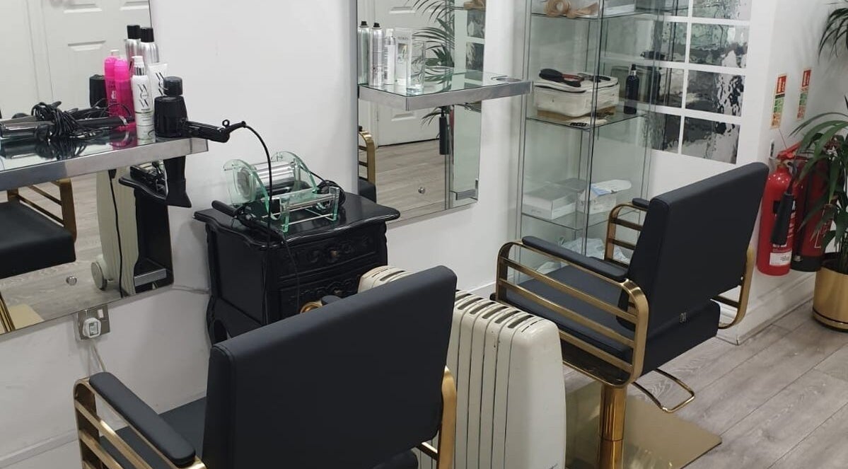 Modern salon chairs and hair products at Ray's House of Beauty Kingston, Kingston Upon Thames, England, GB.