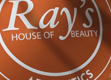 Stylish signage for Ray's House of Beauty Kingston, located in Kingston Upon Thames, England, GB.