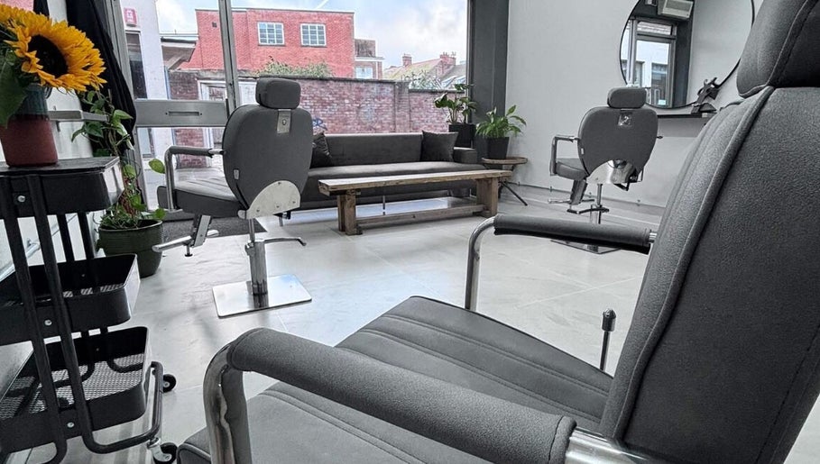Modern salon seating at Hairbymia.at.apollo, Taunton, England, GB with stylish decor and natural light.