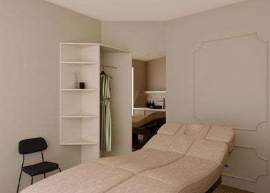 Cameră de relaxare la Baliss Spa Caramfil, București, București, RO cu pat de masaj elegant.