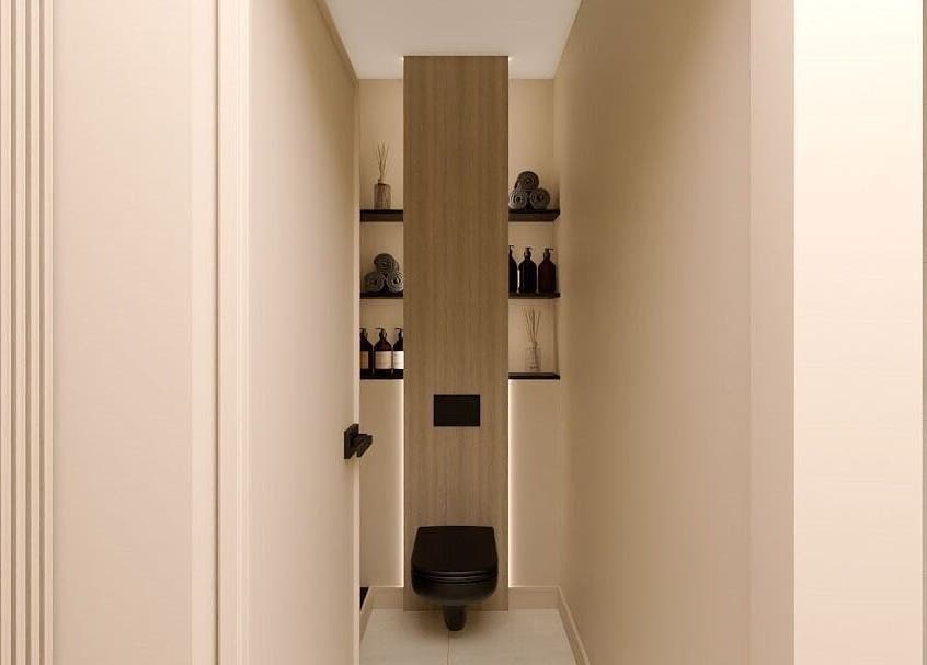 Toaletă elegantă la Baliss Spa Caramfil, București, RO, cu decor minimalist și rafturi cu prosoape.