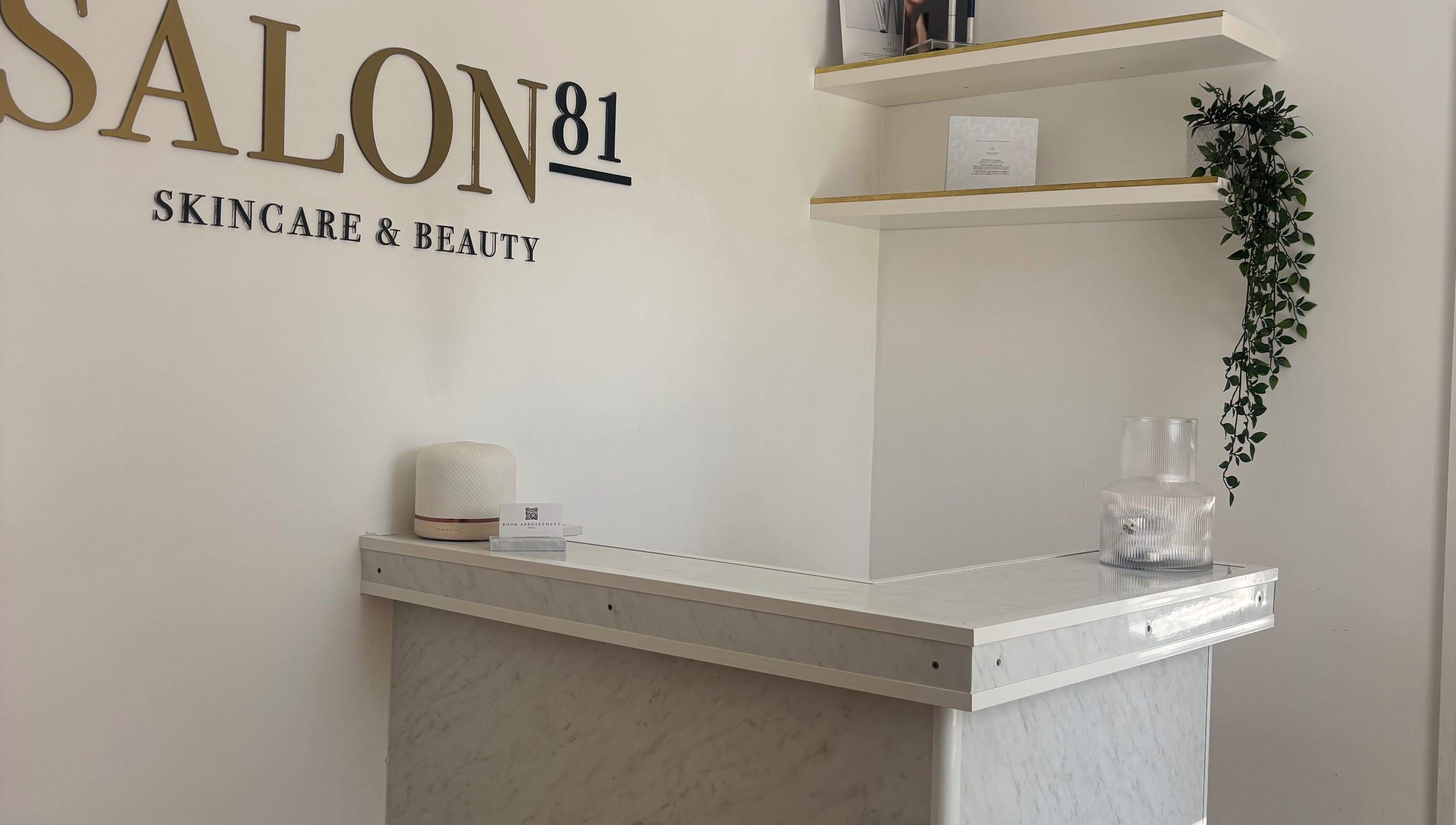 Gloss Beauty Aesthetics entrance with elegant marble counter in Peterborough, England, GB.