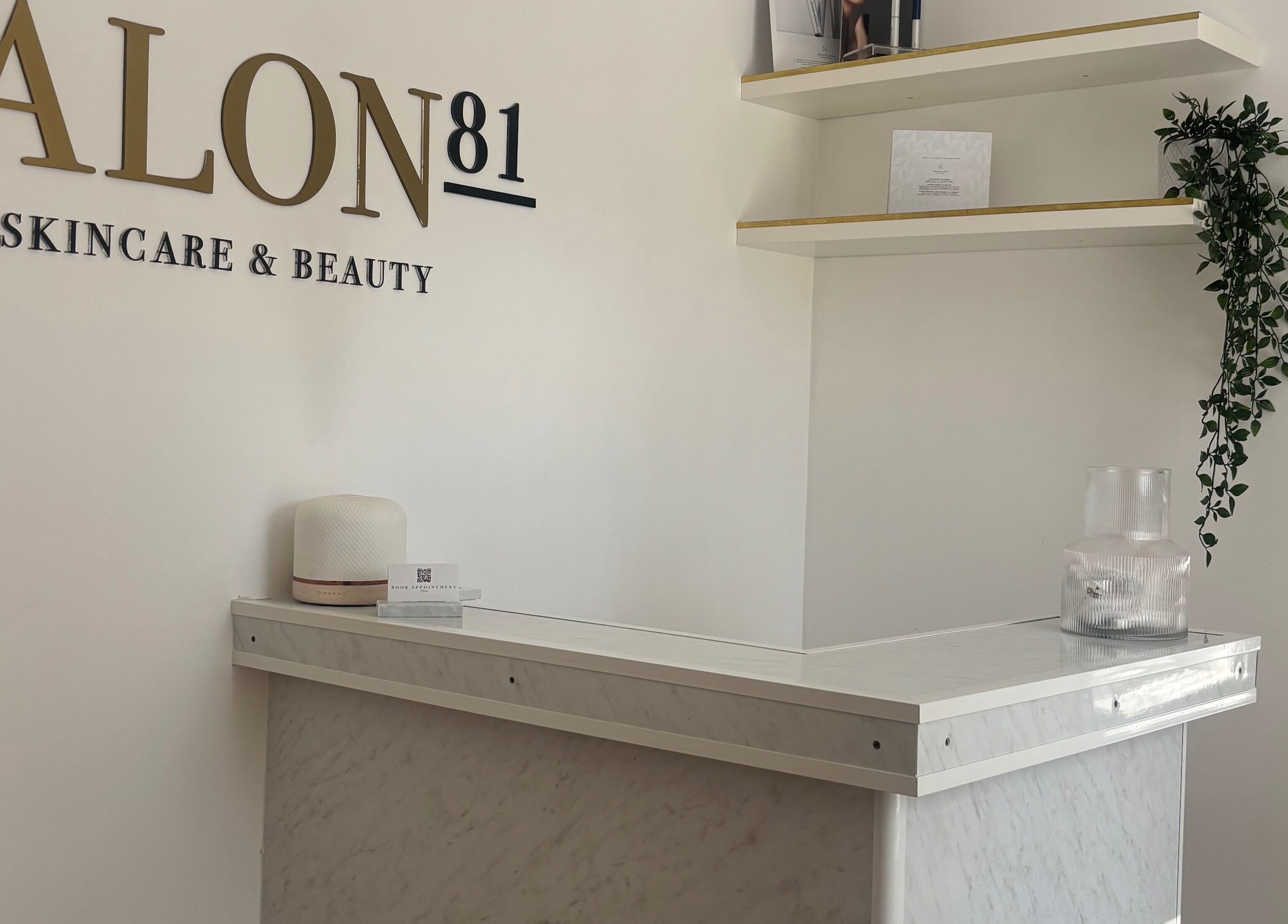 Gloss Beauty Aesthetics entrance with elegant marble counter in Peterborough, England, GB.
