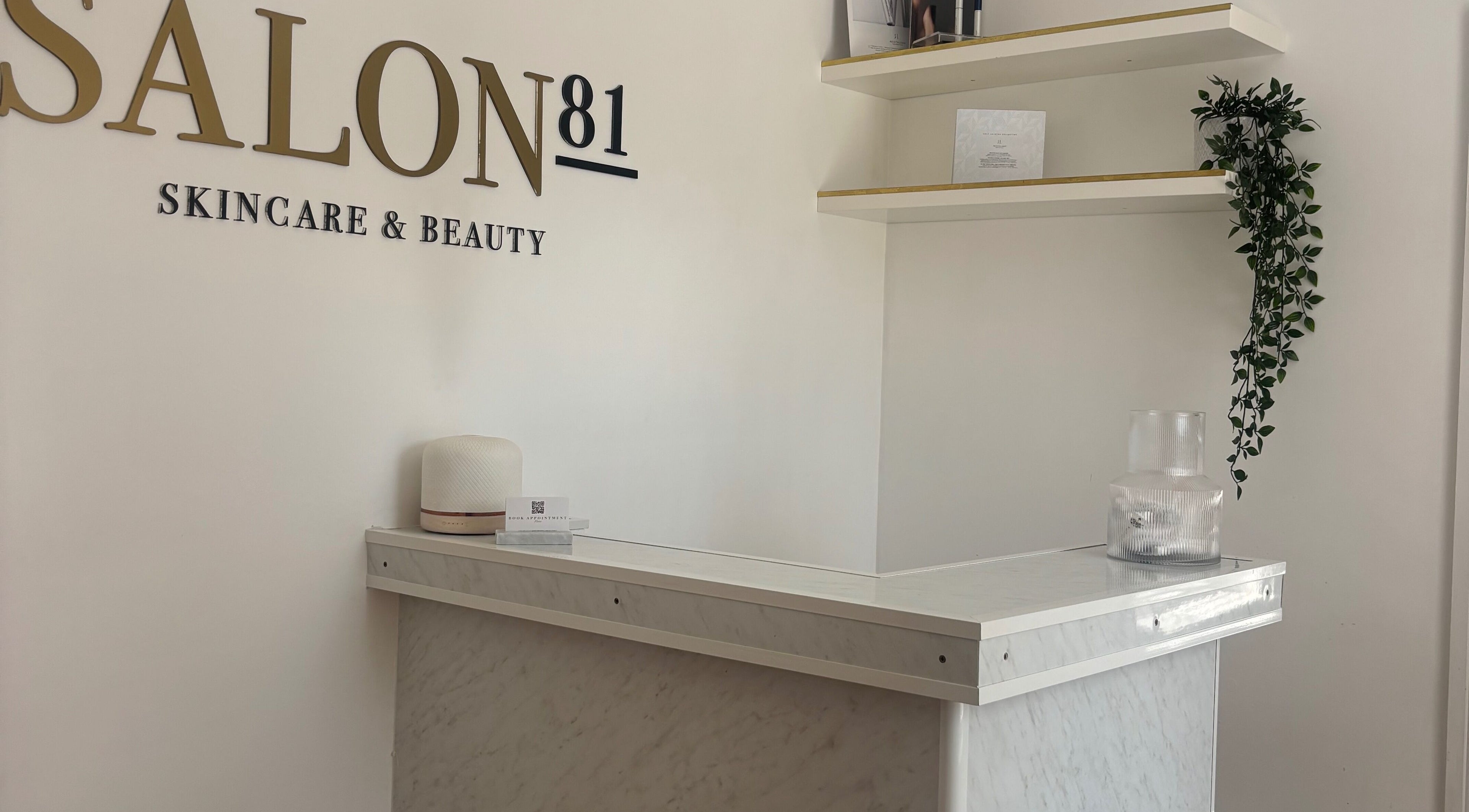 Gloss Beauty Aesthetics entrance with elegant marble counter in Peterborough, England, GB.