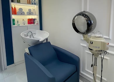 Modern hair washing station at Lumiere Ladies Salon, Dubai, AE, highlighting comfort and style.
