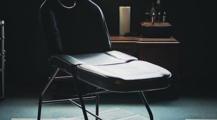 Luxury massage chair at Enchantress, Shelbyville, Tennessee, US with ambient lighting.