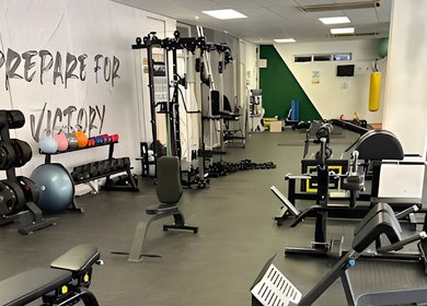 Modern gym at Wanderers Sports Medical Centre, Johannesburg, Gauteng, ZA, with a variety of exercise equipment.