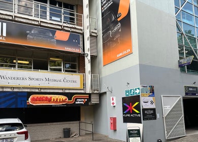 Entrance of Wanderers Sports Medical Centre in Johannesburg, Gauteng, ZA with clear signage.