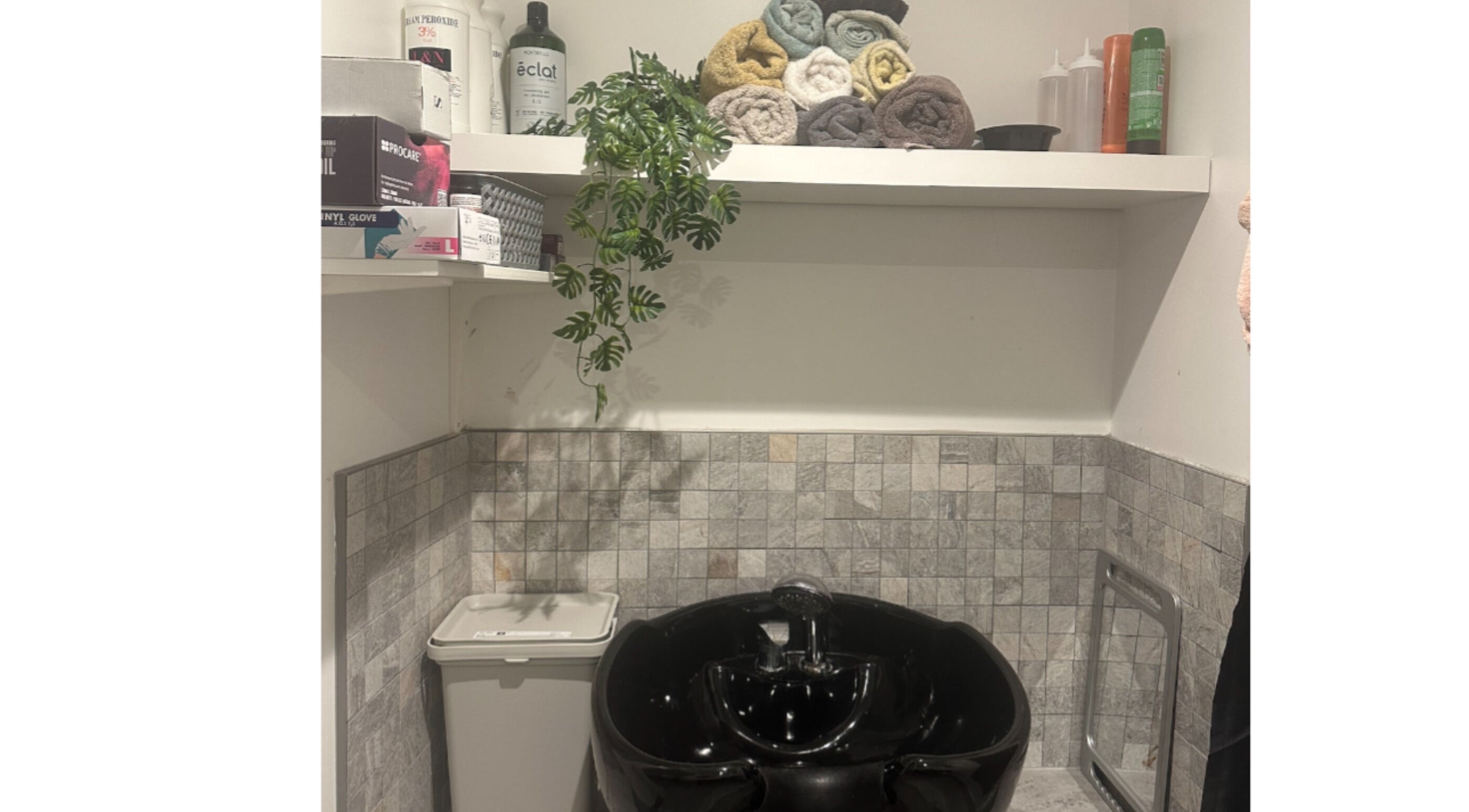 Relaxing spa wash area at Hair.by.kitty, Bletchley, England, GB with stylish sink and accessories.
