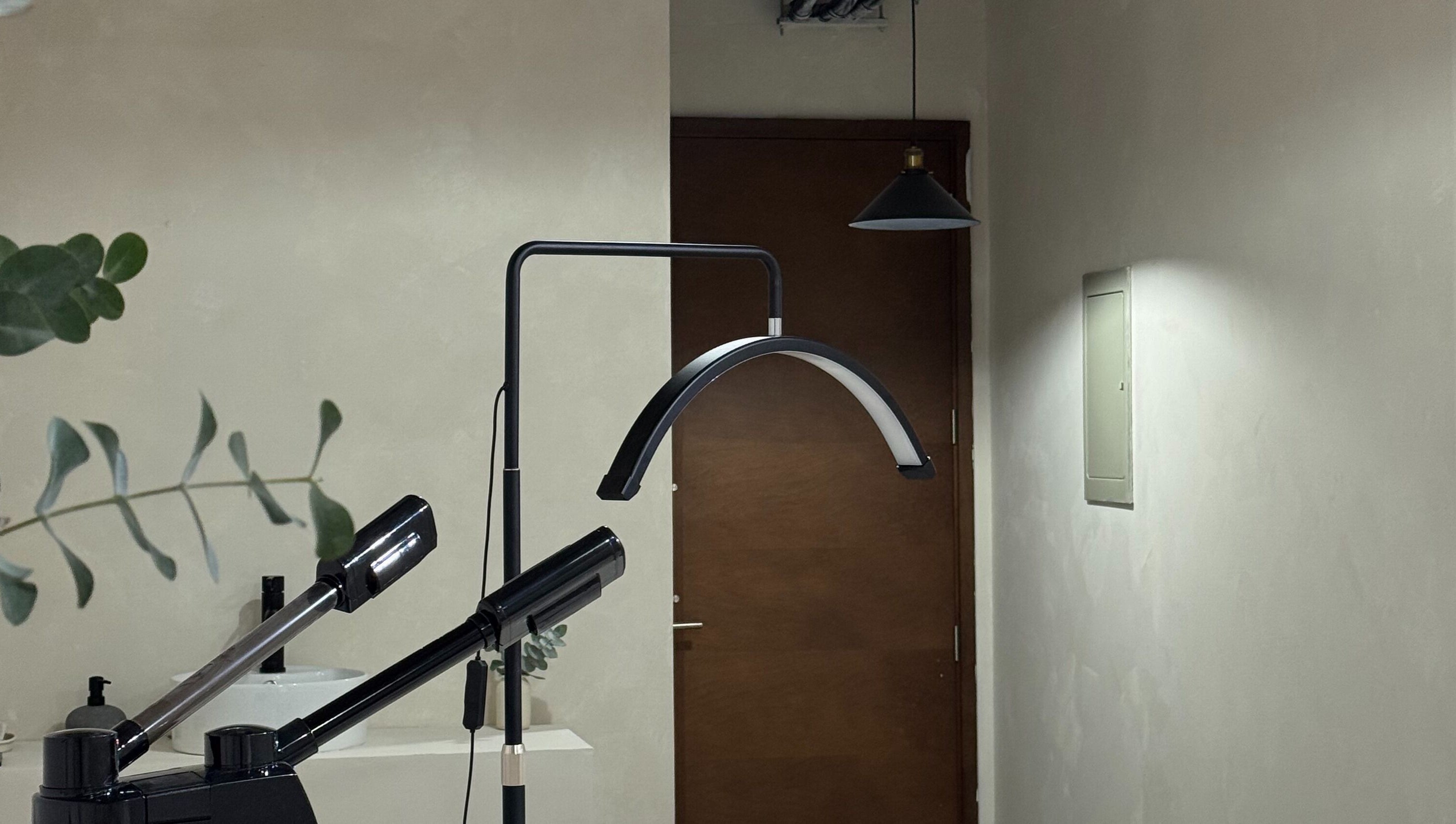 Modern hair styling equipment at Permake Studio, Providencia, Región Metropolitana, CL, creates a serene atmosphere.