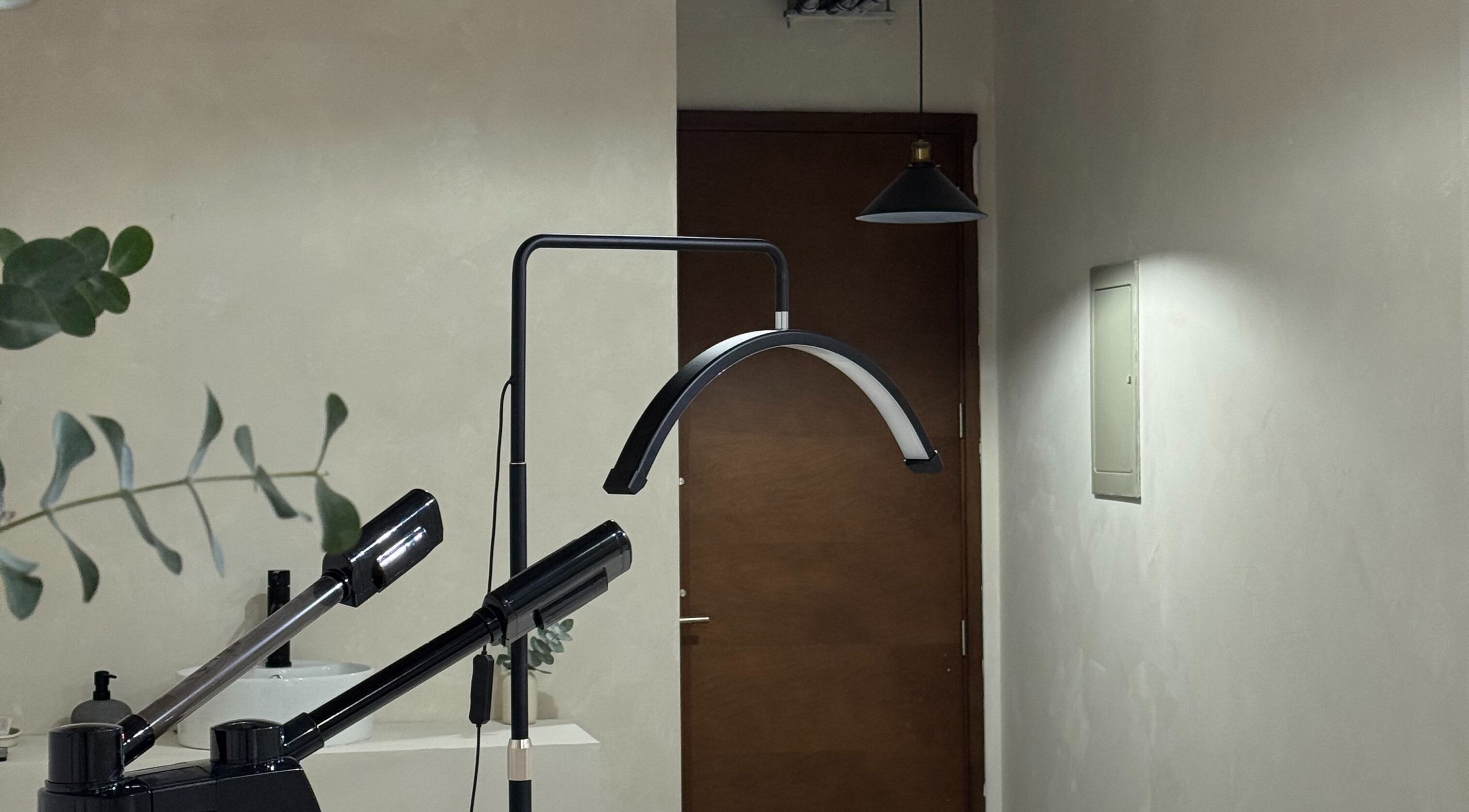 Modern hair styling equipment at Permake Studio, Providencia, Región Metropolitana, CL, creates a serene atmosphere.