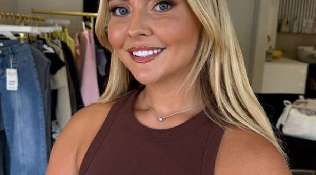 Smiling woman with polished makeup at Marriage Material Make up, Dartford, England, GB.