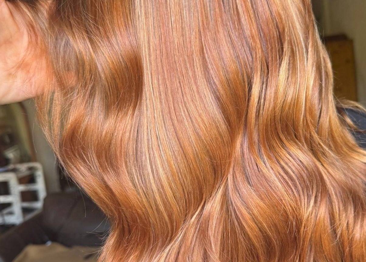 Golden wavy hair styled at Hair by Joshua James in Mallorca, Illes Balears, ES.