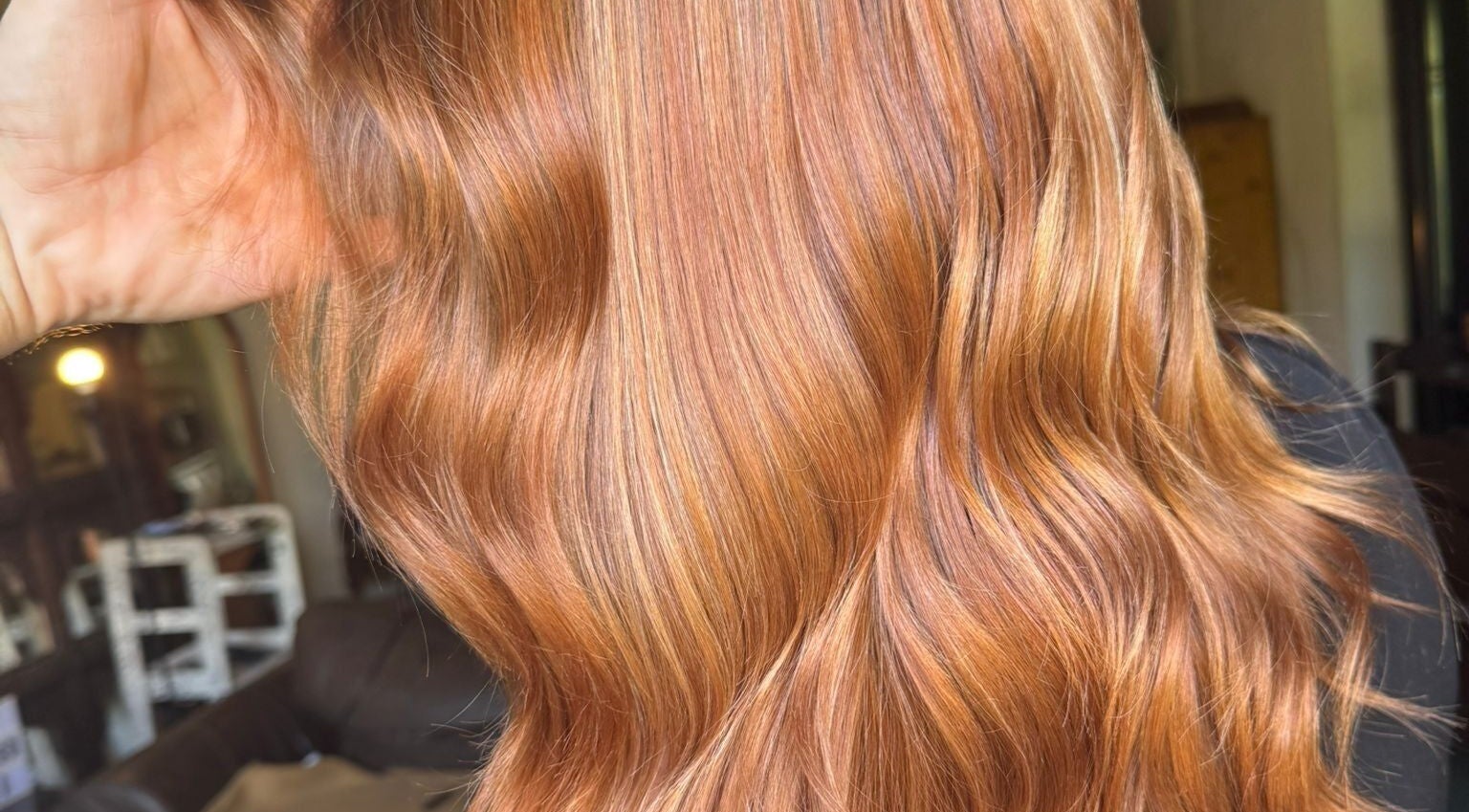 Golden wavy hair styled at Hair by Joshua James in Mallorca, Illes Balears, ES.