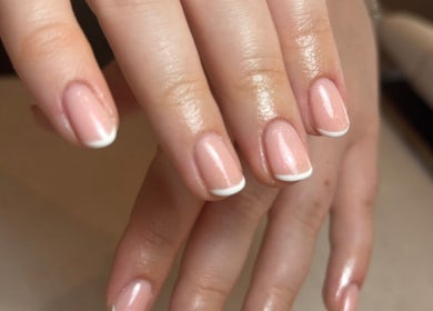 Elegant French manicure at AnnaRaeBeauty in Paisley, Scotland, GB, showcasing expert nail care.