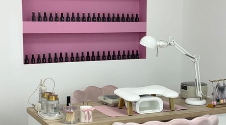Nail station at Anna Rae Beauty, Paisley, Scotland, GB with pink shelves and manicure tools.