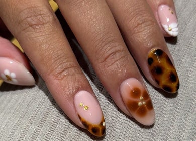 Beautiful floral and tortoiseshell nail art design by Gels By Bethan in Marske-by-the-sea, England, GB.