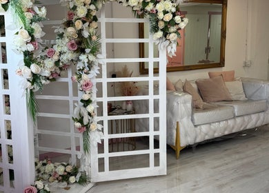 Elegant floral decor and chic seating at Nails by Miki, Wilnecote, England, GB exude a welcoming atmosphere.