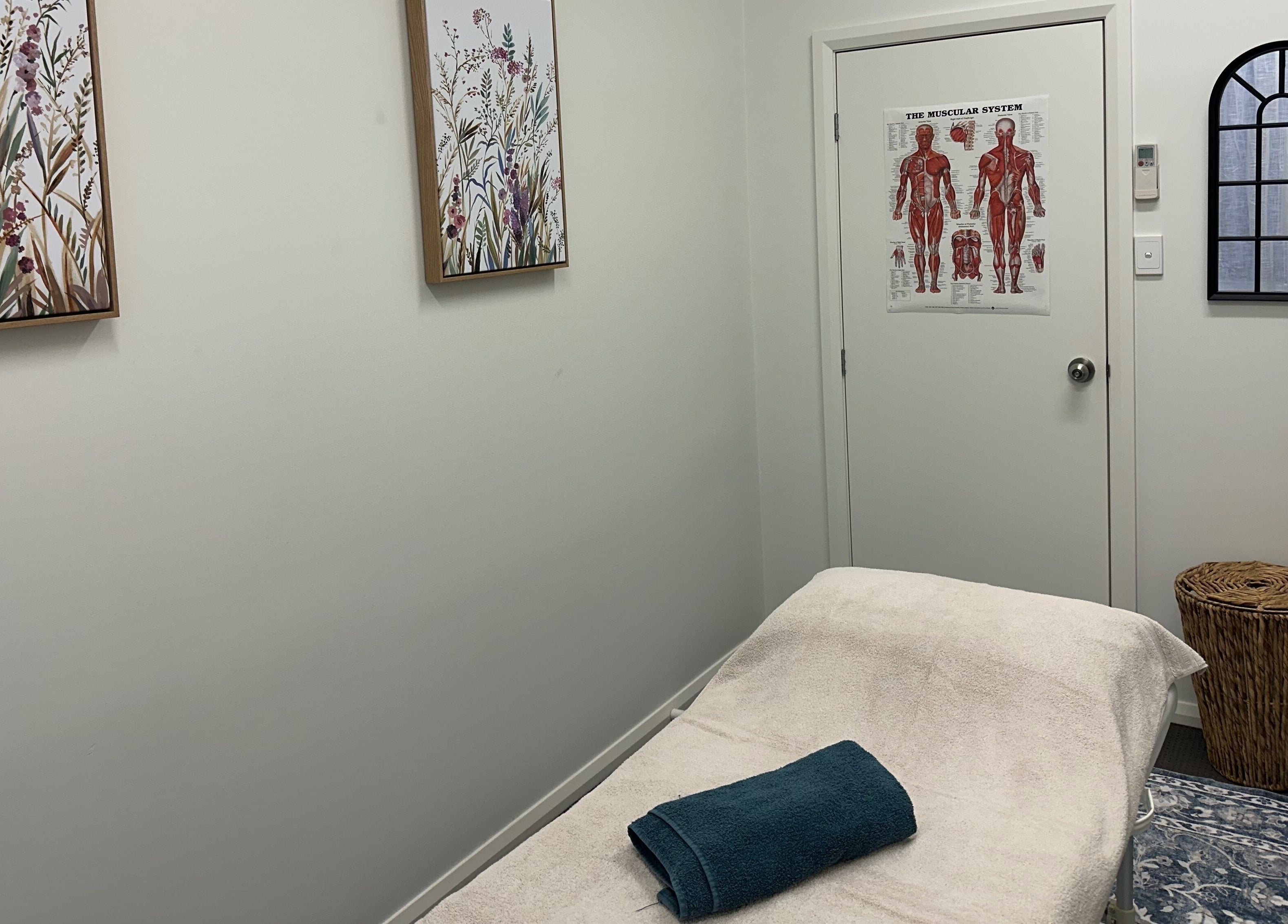 Calming treatment room at Gaia Holistic Therapies, Wagga Wagga, New South Wales, AU, featuring serene decor.