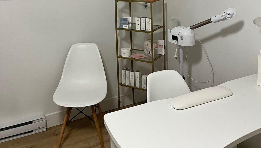 GSkinStudio treatment area in Dieppe, New Brunswick, CA with modern furniture and skincare products.