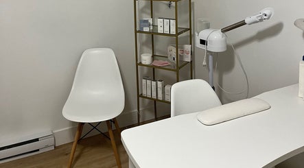 GSkinStudio treatment area in Dieppe, New Brunswick, CA with modern furniture and skincare products.