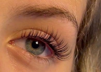 Close-up of elegant eyelash extensions at Belle Beauty Esthetics in Kingston, Ontario, CA.