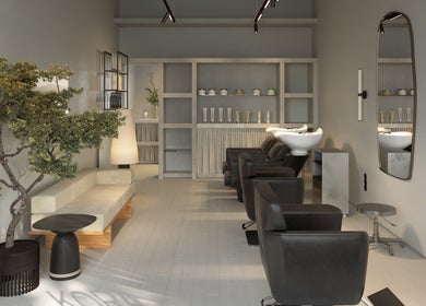 Elegant interior of Kora Beauty Space, Cascais, Lisboa, PT, featuring modern salon chairs and sleek decor.
