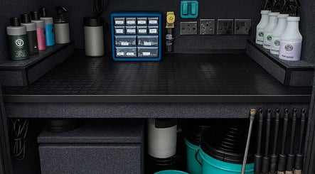 Neatly arranged products on shelves at Detail Hub, Southend-on-sea, GB, highlighting efficient organization.
