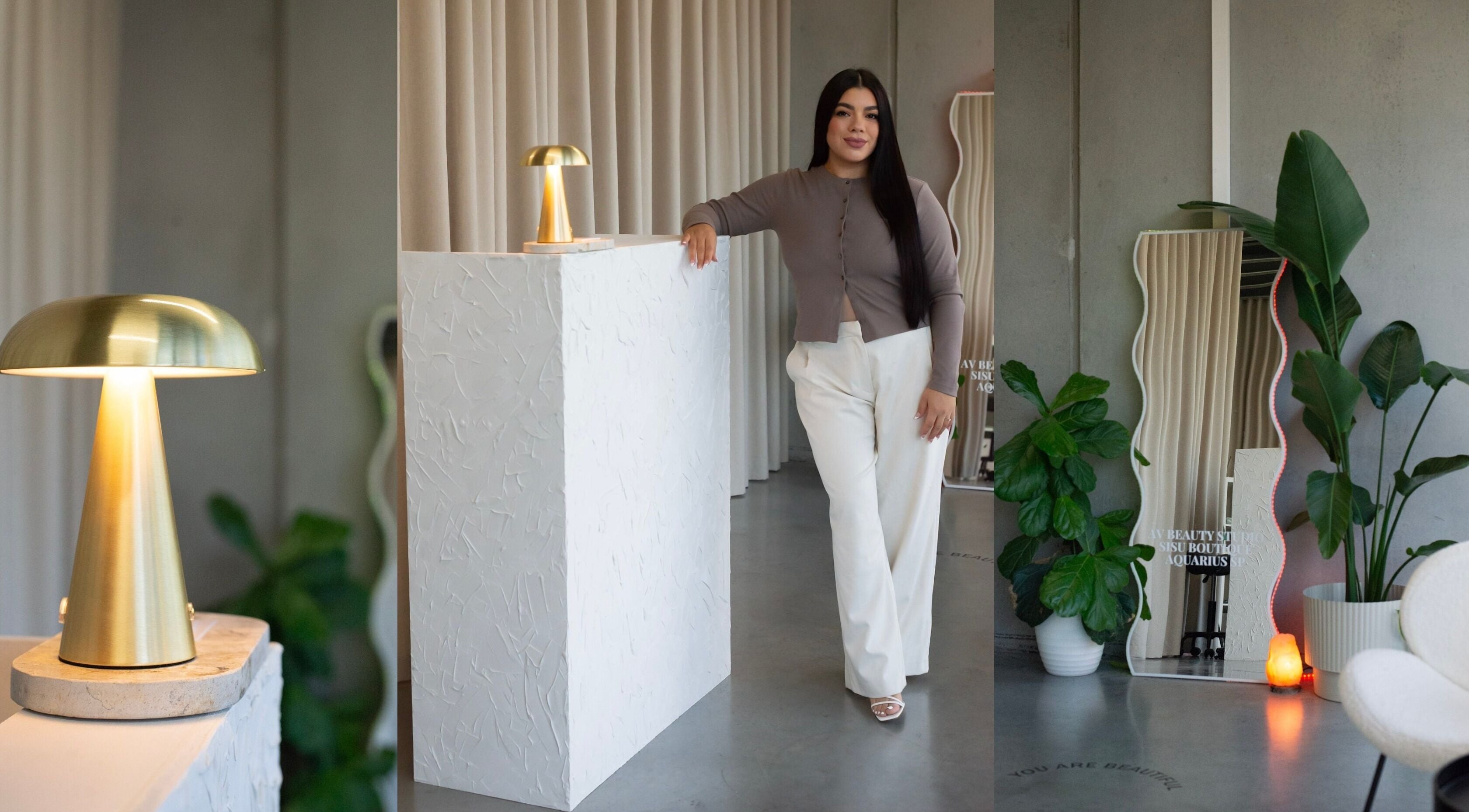 Modern interior of AV BEAUTY STUDIO in Melbourne, Victoria, AU with a smiling staff member near reception.