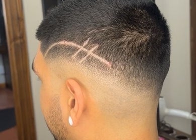 Artistic buzz cut design at Nova Beauty Boutique by Carla Torres, Santa Fe, New Mexico, US.