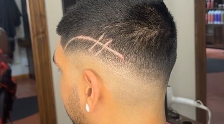 Artistic buzz cut design at Nova Beauty Boutique by Carla Torres, Santa Fe, New Mexico, US.