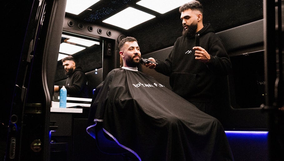 Gentleman receiving haircut at Montana Fades Mobile Barbershop, Dubai, Dubai, AE.