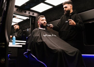 Gentleman receiving haircut at Montana Fades Mobile Barbershop, Dubai, Dubai, AE.