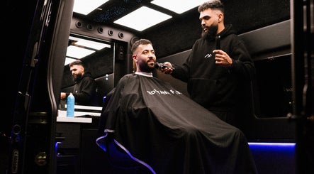 Gentleman receiving haircut at Montana Fades Mobile Barbershop, Dubai, Dubai, AE.